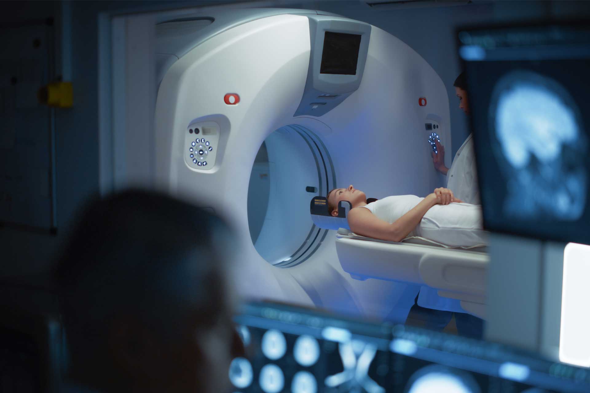 woman going inside mri machine